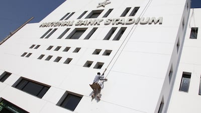 Workers renovate the National Stadium for the upcoming ICC Champions Trophy in Karachi. EPA
