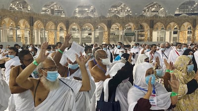 Muslim pilgrims wear masks in the holy city of Mecca, Saudi Arabia. AP