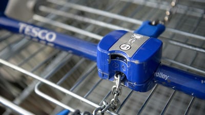 A supermarket trolley takes the old one-pound coins. The new £1 coin, billed by the Royal Mint as the ‘most secure coin in the world’, would replace the round coins by 2017. Bethany Clarke / Getty Images