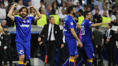 Andrea Pirlo, left, and Juventus teammates celebrate after reaching the Champions League final over Real Madrid last month. Curto de la Torre / AFP / May 13, 2015