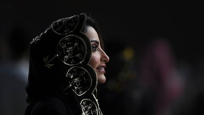 A woman enjoys the Saudi Cup. AP