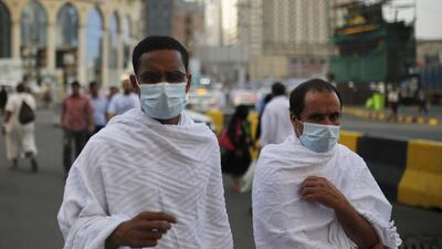 Face masks protect the wearers from dust and germs. Ahmad Masood / Reuters