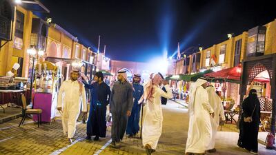 Visitors in the 'Egyptian Village' area of the festival. Maxime Fossat for The National