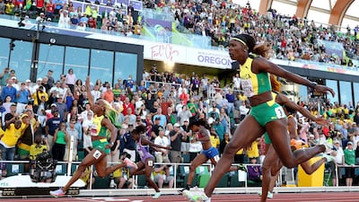 Shelly-Ann Fraser-Pryce crosses the finish line to win gold ahead of silver medalist Shericka Jackson and bronze medalist Elaine Thompson-Herah. Getty