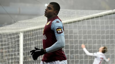 Aston Villa's Wesley, left, celebrates after scoring his side's fifth goal. AP