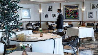 Tables are spaced far apart at the restaurant. Victor Besa / The National