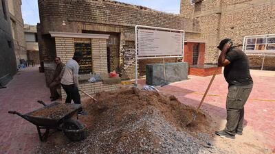 Labourers repair the centuries-old shrine of the revered rabbi in an effort to revive the long-faded heritage of Iraq's Jewish community