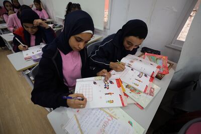 Pupils wearing the hijab at Ahmed Mahmoud Mustafa School in Dokki district, Giza. EPA