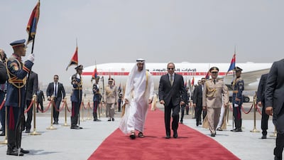 Sheikh Mohamed bin Zayed, Crown Prince of Abu Dhabi and Deputy Supreme Commander of the Armed Forces, is received by Abdel Fattah El Sisi, President of Egypt, upon arrival at Cairo international Airport, commencing an official visit. Mohammed Al Hammadi / Crown Prince Court - Abu Dhabi