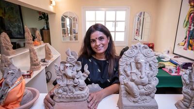 Savvy Kisani hand sculpts clay Ganesh idols at her home in Dubai. Antonie Robertson / The National