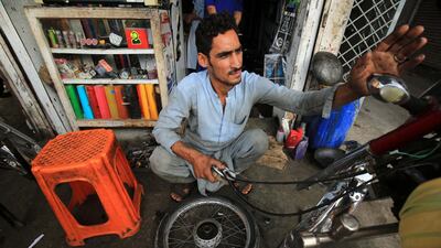 Aimal Khan, a 26 year- old Afghan refugee, who is living in Pakistan for years, works at motorcycle repairing workshop on the eve of the in Peshawar, KPK province, Pakistan. Pakistan hosts more than 1.5 million Afghan refugees and has repatriated more than one hundred thousand refugees back to their country in the last two years. EPA