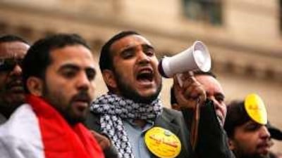 A supporter of the Egyptian opposition movement Kefaya (Enough) chants slogans during a demonstration against presidential succession outside the supreme court in Cairo yesterday.