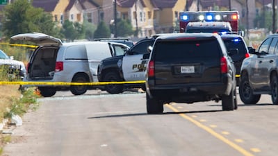 Odessa and Midland police and sheriff's deputies surround a white van in Odessa, Texas, after reports of gunfire. Police said there are "multiple gunshot victims" in West Texas after reports of gunfire on Saturday in the area of Midland and Odessa. AP