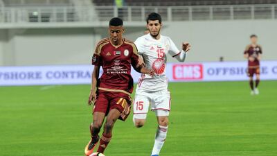 Al Wahda's Mohammed Al Hammadi controls the ball as Sharjah's Al Hassan Saleh defends during their Arabian Gulf League match on February 16, 2017. Courtesy Pro League Committee