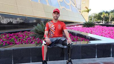 Khalifa Al Muhairi, who died on Tuesday, during his time as a Special Olympics ambassador when the Flame of Hope passed through Zabeel Park in Dubai. Pawan Singh / The National