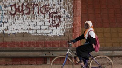 Graffiti near the court in Ouagadougou demands justice for Sankara. Reuters