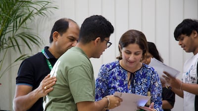 A pupil receives his long-awaited results at Jumeirah College Dubai. Suhail Akram / The National