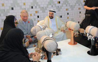 Sheikh Dr Sultan bin Muhammad Al Qasimi, Ruler of Sharjah and Prince Charles meet with women artisans from Irthi Contemporary Crafts Council.