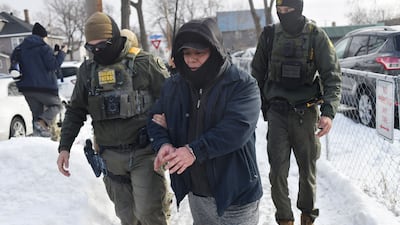 US immigration agents arrest a man in Minneapolis, Minnesota, on Sunday. AFP