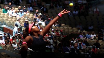 Naomi Osaka serves to Italy's Lucia Bronzetti. AFP
