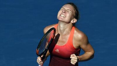 Simona Halep reacts after beating Sabine Lisicki to reach the US Open quarter-finals on Monday in New York City. Jewel Samad / AFP / September 7, 2015