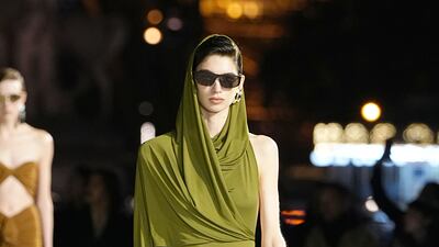 A hooded and draped dress. Getty Images