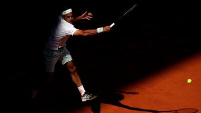 Federer in action from the back of the court. Getty