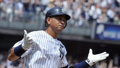 New York Yankees batter Alex Rodriguez reacts as he runs up the first base line after he hit his 600th career home run off Toronto Blue Jays starting pitcher Shaun Marcum in New York, August 4, 2010. REUTERS/Ray Stubblebine