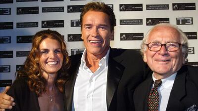 Arnold Schwarzenegger and Maria Shriver with Pierre Cardin during a' Terminator 3' party at the 56th Cannes Film Festival in 2003. AFP