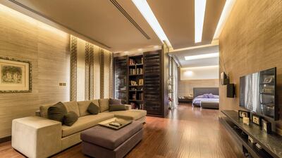 The master suite has its own lounge. Courtesy LuxuryProperty.com