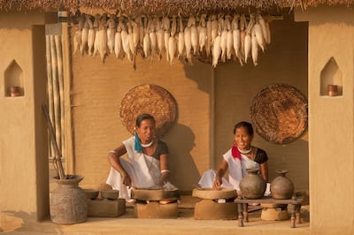Dining experiences in a local Tharu village. Courtesy Meghauli Serai