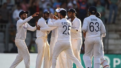 India celebrate the dismissal of New Zealand's Tom Blundell after he was run out for a duck. AFP