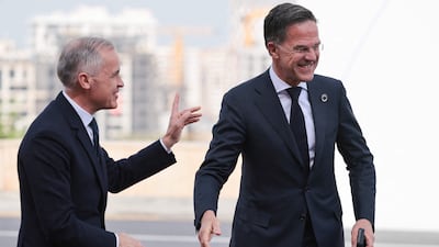 Canadian Prime Minister Mark Carney and Nato Secretary General Mark Rutte arrive to attend the 8th European Political Community summit in Yerevan on Monday. AFP