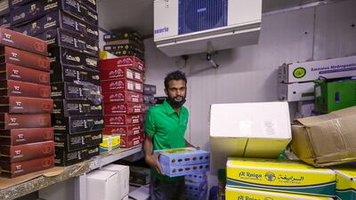 Nuts and date vendors at the Abu Dhabi Dates Market.