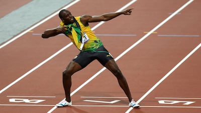 Usain Bolt adopts his trademark celebration after winning the Men's 200m Final at the London Olympics PA