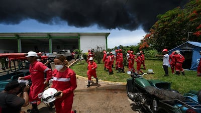 Firefighters in action in Matanzas, western Cuba. AFP
