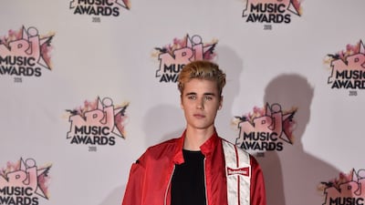 Justin Bieber, in a vintage Budweiser Racing Jacket, attends the 17th NRJ Music Awards at Palais des Festivals on November 7, 2015, in Cannes, France. Getty Images