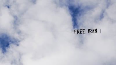 A banner towed by an out-of-shot light aircraft over in Los Angeles, as part of demonstrations supporting protests in Iran. Reuters