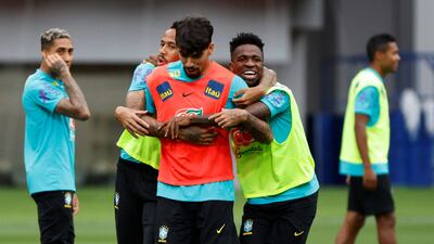 Brazil's Vinicius Junior and teammates train on Sunday. Reuters