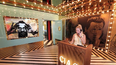 The reception area, complete with chef Massimo Bottura in wall-art-form. Chris Whiteoak / The National