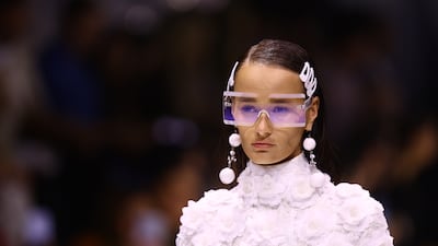 A model in all-white at the Amato show. Getty Images