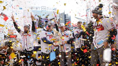 Atlanta Braves manager Brian Snitker holds the Commissioner's Trophy during a celebration at Truist Park on November 5, 2021, in Atlanta, Georgia. EPA