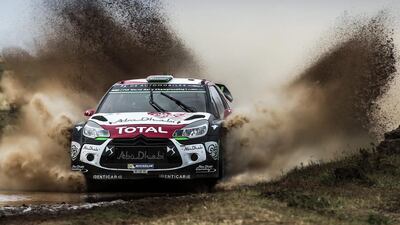 Sheikh Khalid Al Qassimi bounced and splashed his Total Abu Dhabi Citroen DS3 WRC car to a 10th-place finish yesterday in the Rally Sardinia. Nikos Mitsouras / EPA