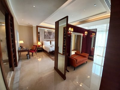 Among the Al Raha Suite's features are a walk-in closet, a large Jacuzzi, and a dining table that seats eight. Photo: Al Raha Beach Hotel and Spa