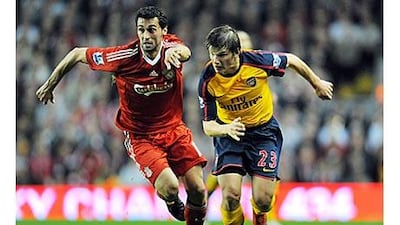 Liverpool's Spanish defender Alvaro Arbeloa, left, is to leave Anfield and join Real Madrid.