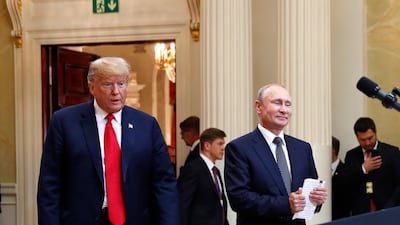 Donald Trump and Vladimir Putin spent more than an hour behind closed doors. Pablo Martinez Monsivais / AP