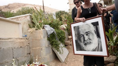 Fans of Khaled Khalifa, who died on Saturday, say their final farewells, in Damascus. All photos: Hasan Belal for The National