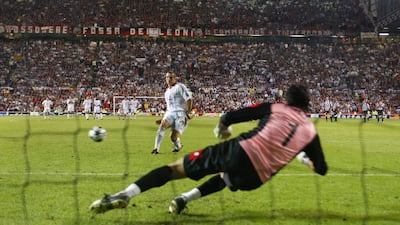 Andriy Shevchenko scores the winning penalty in the shootout against Juventus in 2003