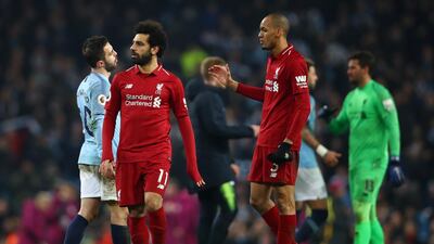 Bernardo Silva of Manchester City reacts as Fabinho of Liverpool attempts to shake hands with him after the Premier League match. Getty Images