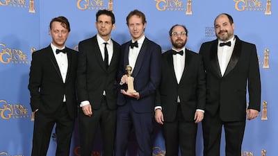 Levente Molnar, from left, Geza Rohrig, Laszlo Nemes, Gabor Sipos, and Gabor Rajna pose in the press room with the award for best motion picture — foreign language for Son of Saul at the 73rd annual Golden Globe Awards. Jordan Strauss / Invision / AP